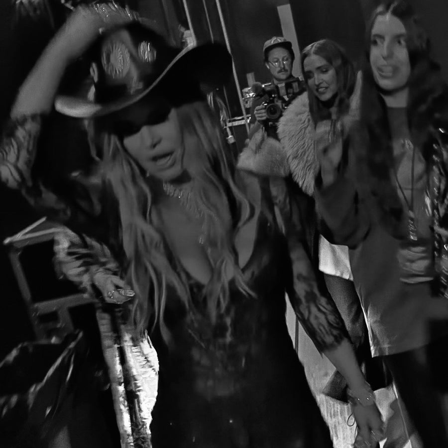 black and white image of jessica Simpson backstage