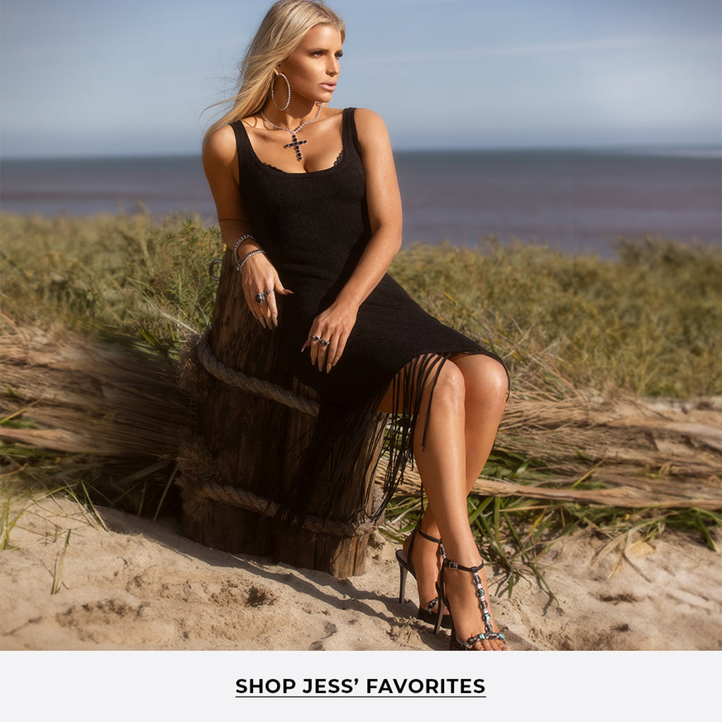 Jessica Simpson on the beach in a dress and shoes. Shop Jess' Favorites link to collection