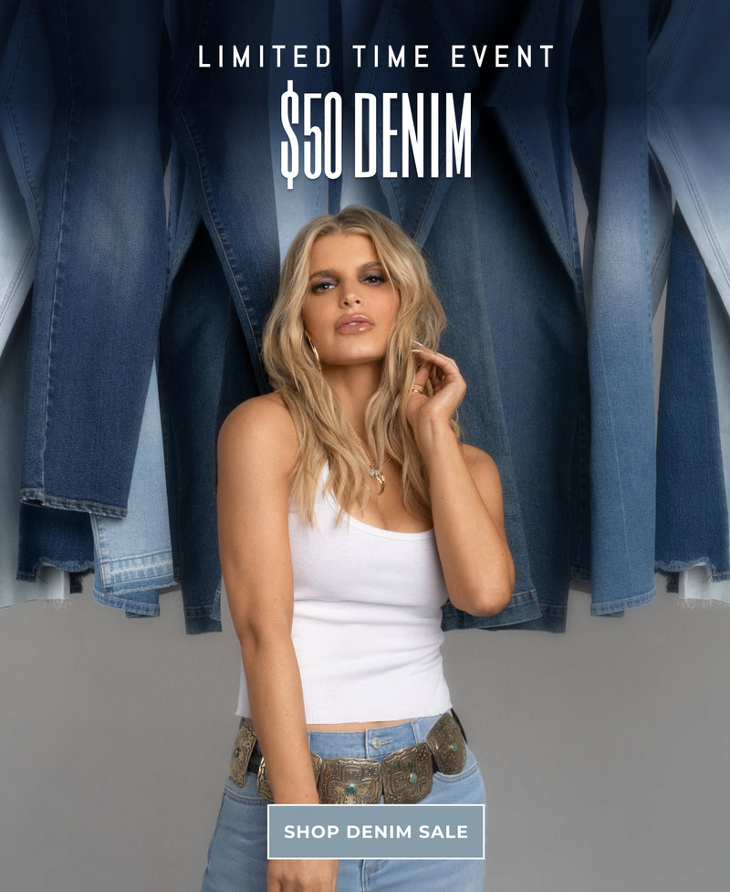 Jessica Simpson wearing a white tank top and light blue jeans stands in front of hanging denim, with promotional text on the left reading 'LIMITED TIME EVENT $50 DENIM' and 'SHOP DENIM SALE'