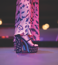 Jessica Simpson wearing the AAMINA shoe on stage